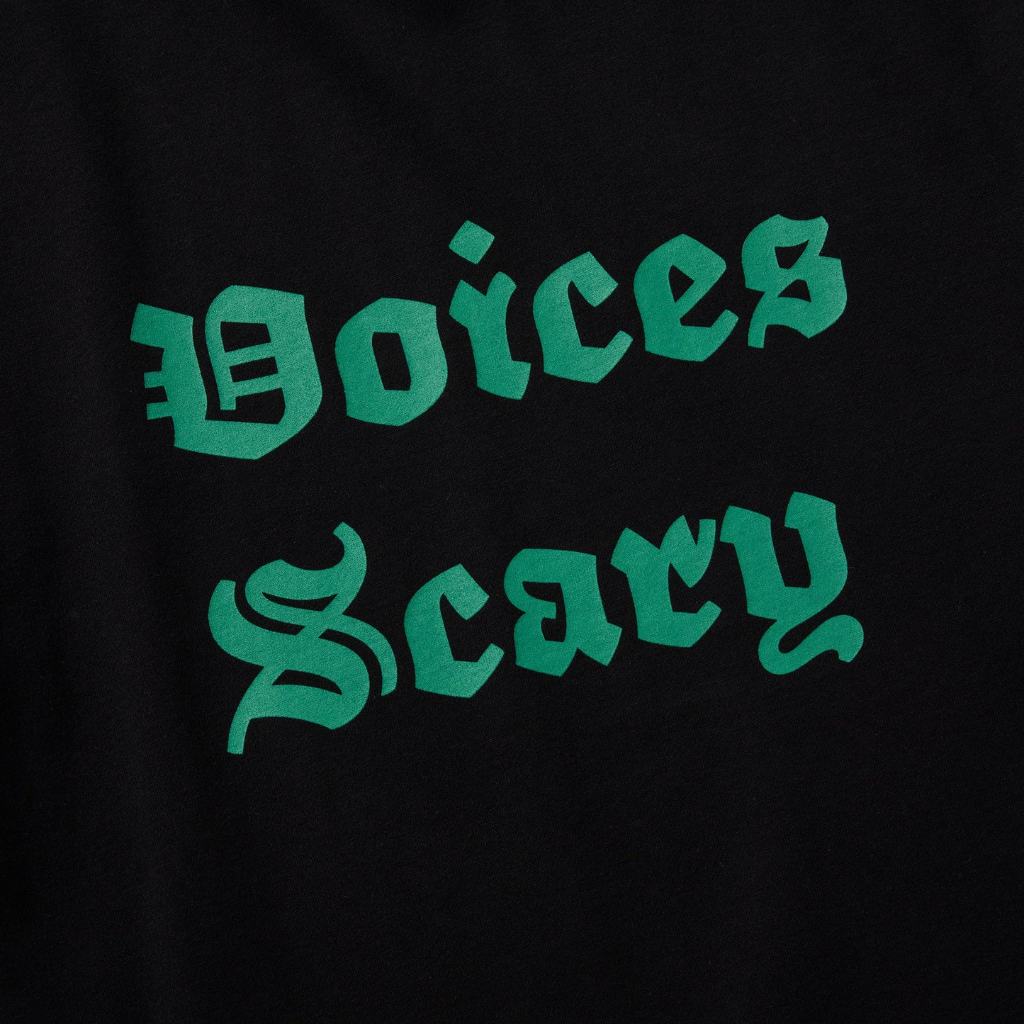 S/S PRINT TEE (VOICES SCARY) BLACK/GREEN